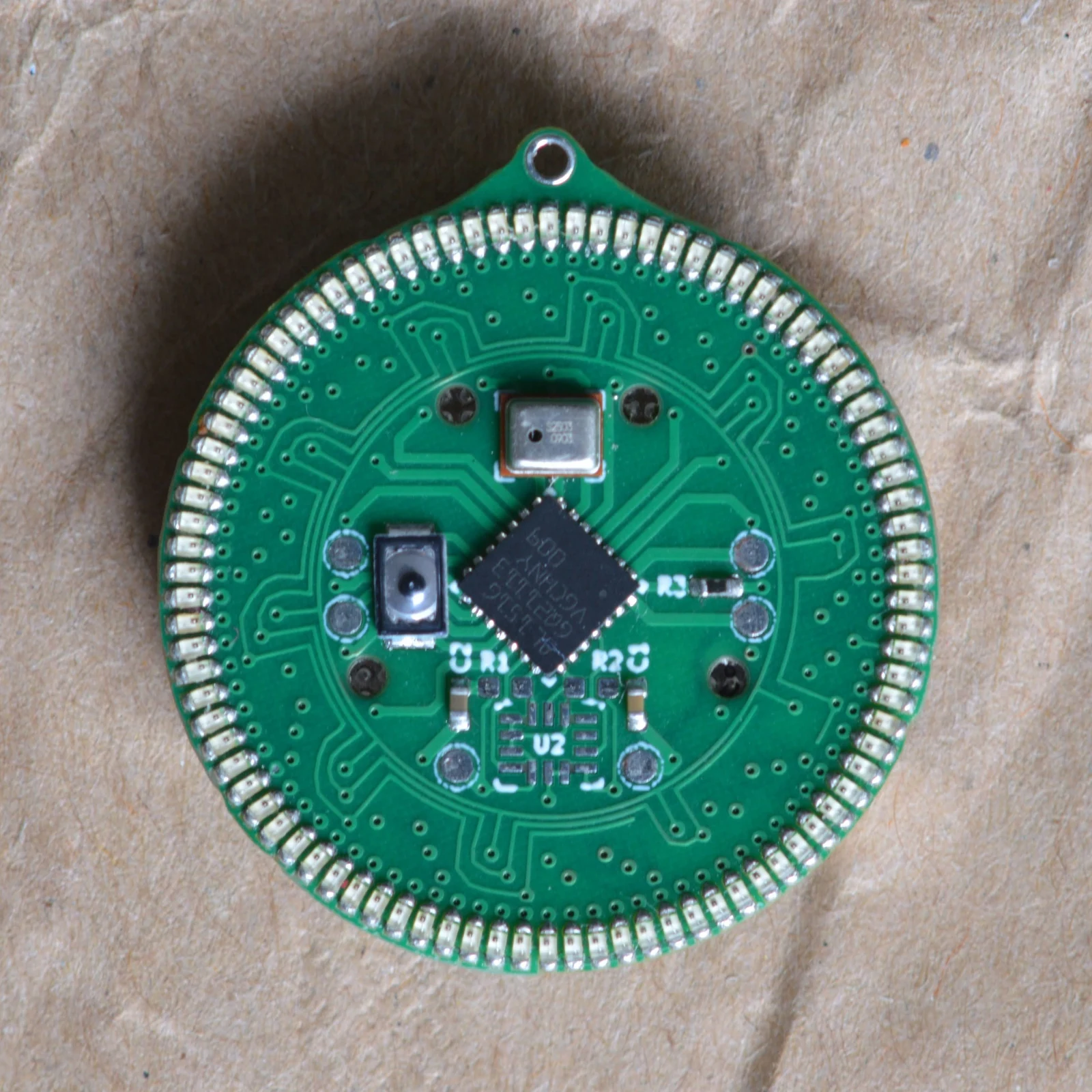 Front view of the Halo 90 circular circuit board earring
